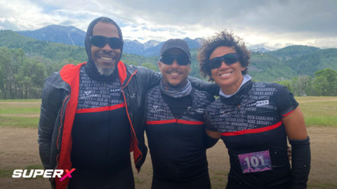 Pro-am adventure athlete Jonny Moses Soto-Altrogge (center) with teammates Lizelle Jackson and Cliff Lyles wearing SuperX sunglasses by EnChroma at the Teton Ogre Adventure Race, Swan Valley Idaho (Photo: Business Wire)