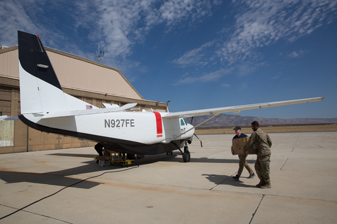 Military personnel load time-sensitive cargo into a Reliable Robotics ?aircraft for autonomous flight delivery (Photo: Business Wire)