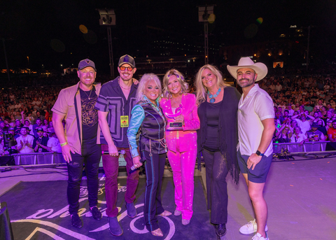 Tanya Tucker receives 2024 Promise Award from Susan G. Komen on 8/24/2024 at Orville Peck's 6th Annual Rodeo (In photo left to right: Ryan Davis, Joshua Daniel, Tanya Tucker, Shirley Burns, Amy Fish, Marcus Frisch) (Photo Credit: Derrek Kupish)