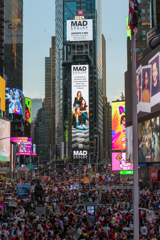 New Mad Engine Global C-Suite team members featured in New York’s iconic Time Square for the announcement this week (Photo: Business Wire)