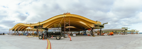 Snyder's team constructed each 12,000-square-foot roof section on the ground, where they were then transported nearly three-quarters of a mile, lifted 80 feet into the air, where each section was then connected to make the completed roof structure. (Photo: Business Wire)