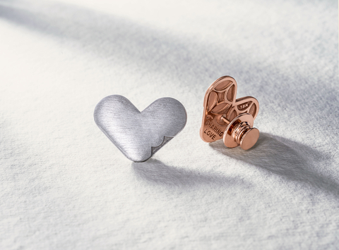 TACORI's special edition "Sharing Love" pin supporting the American Cancer Society is available in silver, 18K white, rose and yellow gold. (Photo: Business Wire)