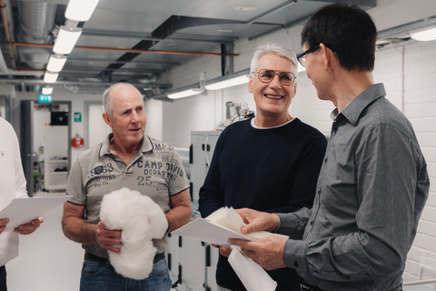 Blueair and Lanaco executives working on the wool filter in the Blueair lab in Stockholm, Sweden. (Photo: Business Wire)