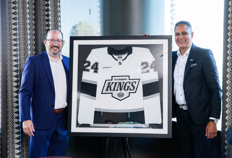 Dan Beckerman, President and CEO of AEG & Rene LaVigne, President and CEO of Iron Bow Technologies with LA Kings Jersey (Photo: Business Wire)