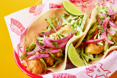 The Baja Fish Taco - a delectable creation featuring beer-battered and fried cod served on a soft corn tortilla complemented by fresh ingredients including shredded cabbage, house-made cilantro-lime crema, and pickled red onions, all made in-house. (Photo: Business Wire)