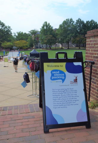 Send Silence Packing exhibit with sign noting support by The Hartford (Photo: Business Wire)