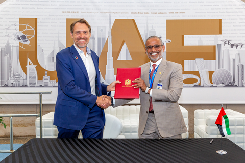 JoeBen Bevirt, Founder and CEO of Joby, presents the company's Letter of Intent to initiate Joby's Air Operator Certificate application to His Excellency Saif Mohammed Al Suwaidi, Director General of the UAE General Civil Aviation Authority. Christina Esteban Photography