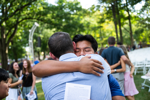 Hillsdale College freshman hugs father. (Photo: Business Wire)