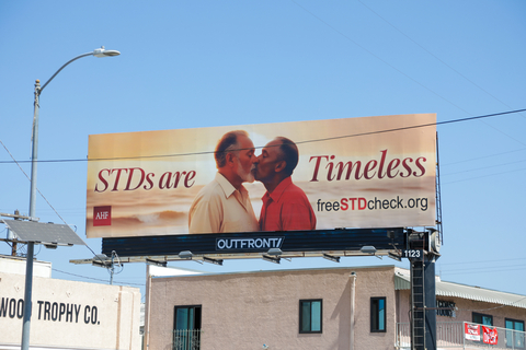 AHF is rolling out a new national outdoor advertising campaign reminding older adults that “STDs are Timeless.” The ads feature a variety of older couples kissing on the beach with an idyllic golden sunset behind them. The “Timeless” headline is accompanied by the URL for AHF’s freeSTDcheck.org website. (Photo: AHF)