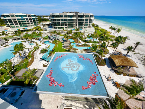 The expansive 60-foot by 60-foot rooftop pool mosaic, featuring over 750,000 handmade tiles, incorporates Corral’s signature large-format custom handmade Smalti mosaic glass chunks, accented with 24kt white and yellow gold inlays within the Jacaranda flowers. (Photo: Business Wire)