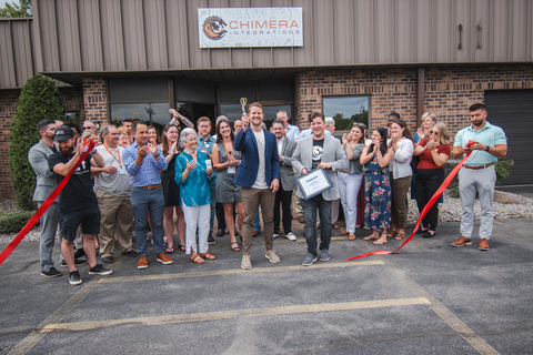 Casey White, President and Founder of Chimera Integrations, proudly cuts the ribbon at the grand opening of the new and improved Syracuse headquarters, celebrating a significant milestone alongside team members and community leaders. (Photo: Business Wire)