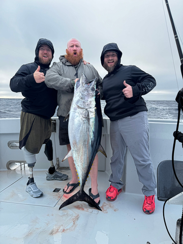 Combat-wounded veterans show off their catch during the seventh annual War Heroes on Water charity sportfishing tournament. (Photo: Business Wire)