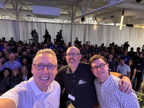 GSI's Dominic Ivankovich and KKR's Pete Stavros and Brandon Brahm celebrate the news with GSI employees (Photo: Business Wire)