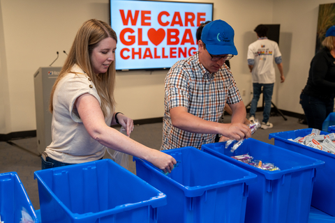 Team Schein Members assemble hygiene kits as part of Henry Schein's 'We Care Global Challenge.' (Photo: Business Wire)