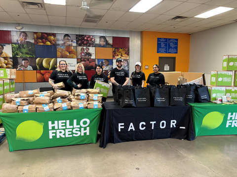 Volunteers distributed meals to the community today via a drive-through donation event at St Mary’s Knight Distribution Center.  (Photo: Business Wire)