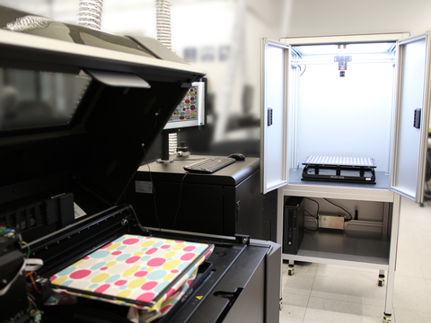 A Stratasys J850 TechStyle™ Solution with the new Fabric Alignment Station (Photo: Business Wire)