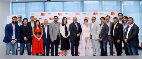 thumbnail Mastercard and Amazon Payment Services team members at the signing event (Photo: AETOSWire)