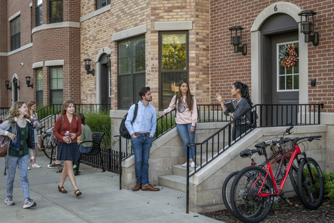 Students conversing on the campus of Hillsdale College. (Photo: Business Wire)