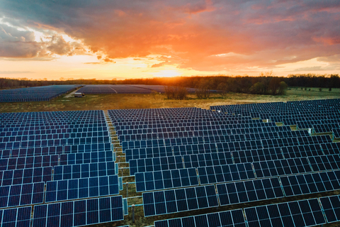 Aerial view of a solar panel array in Delta Township, Michigan during sunset. (Photo: Business Wire)