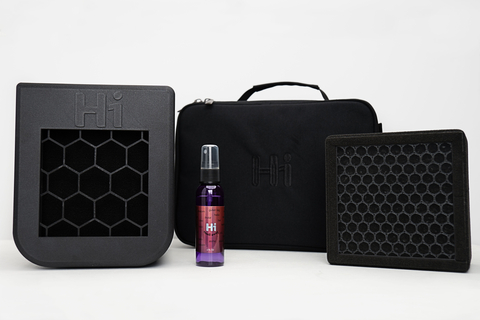 The HotBox portable air filter is pictured with the included bag, extra filter (sold separately), and scent deodorizer spray. (Photo: Business Wire)