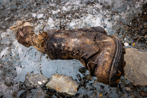 A sock embroidered with "A.C. Irvine", along with a boot, has been discovered on the Central Rongbuk Glacier below the North Face of Mount Everest by a team led by Jimmy Chin. This is the first possible proof of Irvine's death since disappearing during a 1924 expedition. (credit: Jimmy Chin)