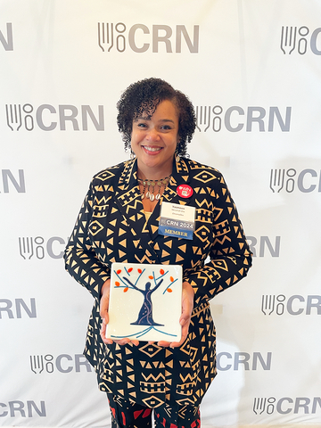 Yasmeen Nkrumah-Elie, Ph.D accepts the Trailblazing Woman Award on stage during CRN's CONVERGENCE Conference (Photo: Business Wire)