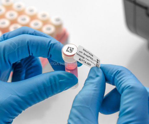 GA International provides a diverse range of lab labels designed to support the unique needs of modern laboratories (In photo: NitroTAG® with SnapPEEL™ Technology (Patent Pending)) (Photo: Business Wire)