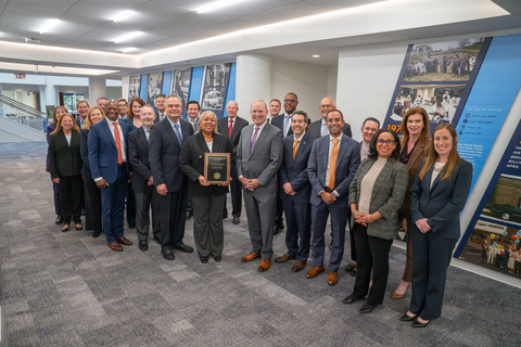 NFCU Leaders and Iwakuni Branch team members receiving "Credit Union of the Year" award. (Photo: Business Wire)