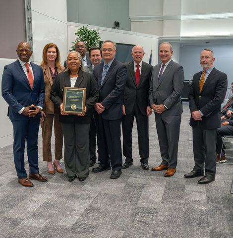 NFCU Leaders and Iwakuni Branch team members receiving "Credit Union of the Year" award. (Photo: Business Wire)