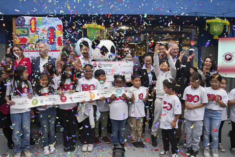 Boys & Girls Clubs of America President and CEO Jim Clark, Co-Founder and Co-CEO of Panda Restaurant Group Dr. Peggy Cherng and youth celebrate the 100th Panda Cares Center of Hope opening at Boys & Girls Clubs of West San Gabriel Valley & Eastside at Estrada Courts on Wednesday, Oct. 16, 2024 in Los Angeles. (Lauren Justice/AP Content Services for Boys & Girls Clubs of America)