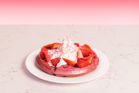 Hampton by Hilton, in collaboration with Paris Hilton’s 11:11 Media, is adding a pop of pink and a dash of sparkle to its legendary waffle lineup with the Sparkling Strawberry Hampton Waffle by Paris Hilton. (Photo: Hilton)