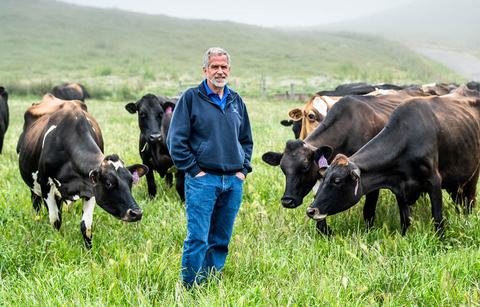 Straus Family Creamery founder Albert Straus with cows at Straus Dairy Farm, which is on track to becoming among the first, if not the first, carbon neutral dairy farms in the United States. (Photo: Business Wire)