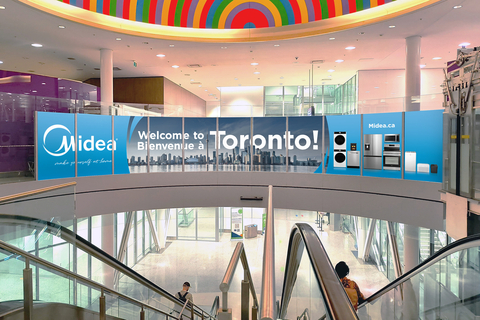 Midea extends a Warm Welcome to Canadian Travelers with New Campaign. Midea Canada, a leader in innovative and value driven home appliances, is thrilled to expand its highly successful "Make Yourself at Home" marketing campaign to airports and key locations across Canada. Launched recently at Toronto Pearson Airport, this campaign underscores Midea’s commitment to simplifying everyday tasks—cooking, cleaning, efficient storage, dishwashing, and laundry into effortless moments of joy. (Photo: Business Wire)