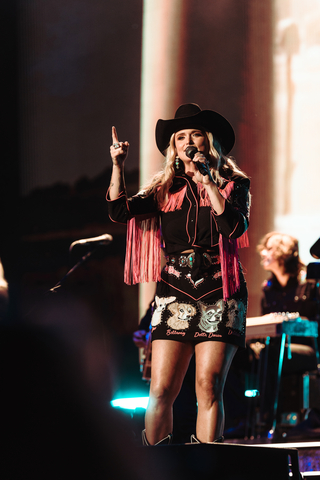 Miranda Lambert performs during the Music for Mutts benefit concert in Nashville on Oct. 5, 2024 wearing a custom outfit featuring images of her rescue dogs. Photo Credit: Tyler Conrad.