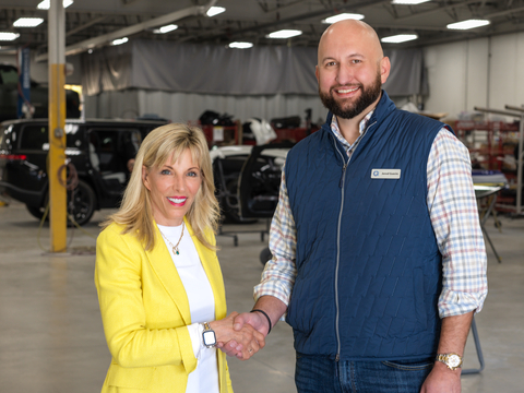 Joanne LaMettry and Jerod Guerin, CEO & Founder of Quality Collision Group (QCG), pose for a photo after announcing QCG's acquisition of LaMettry's Collision in Minneapolis, Minnesota. LaMettry’s 14 shops, which are strictly OEM-focused, fit perfectly within QCG’s business model and bring QCG’s national shop count to 85. This monumental acquisition shows the continued push to position Quality Collision Group as a national leader in the auto repair industry. (Photo: Business Wire)