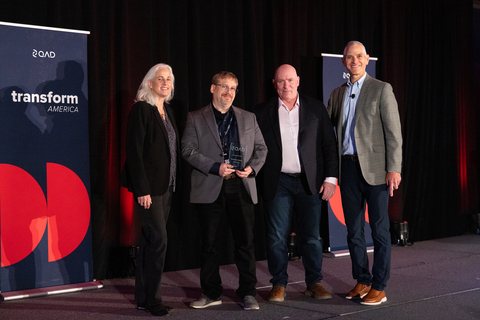 Andrew Amstutz, Vice President of IT at Autokiniton, receiving the Ambassador Award at the 2024 QAD Customer Awards ceremony in Chicago - with QAD Chief Executive Officer Anton Chilton, Chief Customer Officer Sonya Andreae, and Vice President, Customer Success Adam Ciperski (Photo: QAD Inc.)