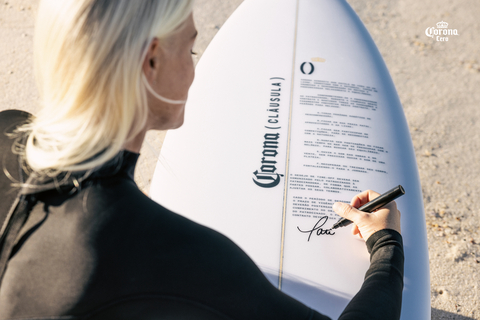 Brazilian surfer Tatiana Weston Webb signs the Relaxation Clause  (Photo: Business Wire)