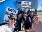 Pinnacle associates cheer on runners at the famous Cooper River Bride Run in Charleston, SC. (Photo: Business Wire)