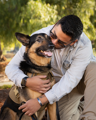 Diego Arias and his Psychiatric Service dog Astra (Photo: Business Wire)