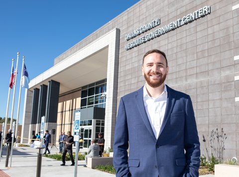 Suffolk Project Manager and Mesquite native Raegan Lucio celebrates the grand opening of the Mesquite Government Center, a building he was proud to build in his hometown. (Photo: Business Wire)