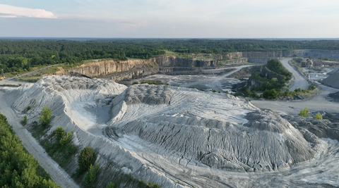 Millions of tons of nutrient-rich volcanic basalt rock-dust, produced as a byproduct of the rock quarrying and aggregate industry. This material can safely and permanently remove and trap carbon dioxide for 10,000-100,000 years, while enriching soils and increasing crop yields on farms. (Photo: Lithos Carbon)