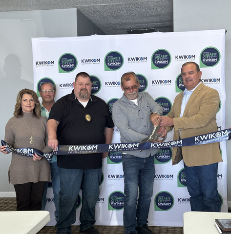 KWIKOM Communications and Cherryvale city officials gather to cut the ribbon, marking the city's new Gigabit City status. Pictured left to right is: Karen Davis, City Clerk; Tim Wilson, Economic Development; Jimmy Holt, Chief of Police; Steve Strickland, City Council Member; and Mike Brigman, President & Chief Operating Officer of WANRack LLC, parent company of KWIKOM Communications. (Photo: Business Wire)