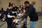 Mercedes-Benz USA employee volunteers participated in interactive safety stations and holiday-themed activities, spreading joy to students while teaching essential winter safety tips. (Photo: Business Wire)