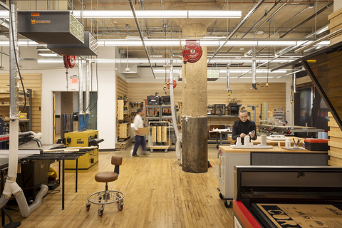 Located near Corgan's headquarters in Dallas' historic West End, The Shop blends traditional craftsmanship with cutting-edge technology. This 3,000-square-foot space, equipped with state-of-the-art tools like 3D printers and laser cutters, empowers architects to bring designs to life through physical models, mock-ups, and full-scale installations. (Photo: Business Wire)