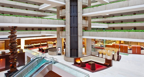 Inviting food and beverage outlets are tucked within the hotel’s lobby atrium. (Photo: Business Wire)