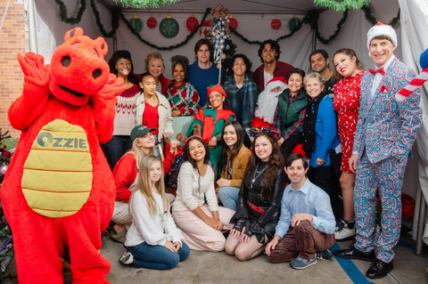 Friends of LuskinOIC helped Santa hand out gifts to over 1,000 pediatric patients, children in the community, and families. Top Row, L - R: Ozzie the Dragon, Sufe Bradshaw, Lexi Underwood, Caroline Rhea, Diandra Lyle, Patrick Luwis, Kieran Tamondong, Drake Rodger, Aiden Coleman, Mary Lou Belli, Jesse Posey, Lizza Monet Morales, BJ Korros. Bottom Row, L - R: Justine Lupe, Kennedy Garcia, Bella Blanding, Andrea Londo, Daire McLeod, Michael Von Der Ahe. Photo credit, Danny Liao