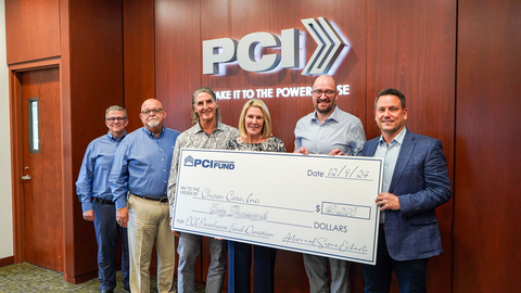 PCI Founders Arturo and Susan Echarte (third left and third right) present Matt Kersh (second right), Chosen's Director of Mission Advancement, and Wade Martin (right), Chosen's VP of Strategic Partnerships, with a grant to their charity organization. Looking on (from left) are Dennis R. Garcia, PCI's Executive VP & CFO, and Ismael Diaz, PCI's President & CEO. The handover took place at the annual PCI Powerhouse Fund Gratitude Gathering Event at PCI's Southeast headquarters in Florida. (Photo: Business Wire)