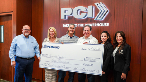 PCI Founders Arturo and Susan Echarte (second and third left) present Andy Fernandez (third right), Firewall Centers Inc.'s CEO, Rachel Taylor, Firewall Centers Inc.'s Finance Director, and Nancy Chevres, Firewall Centers Inc.'s CPO, with a grant to further their organization's mission. Looking on (at left) is Ismael Diaz, PCI's President & CEO. (Photo: Business Wire)