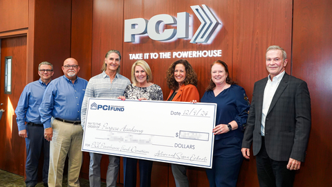 Purpose Academy's contingent of Naomi Peyton (third right), Principal, Tammy J Hoskins (second right), Board Secretary, and David Salvatelli (right), Superintendent, share a photo opportunity with PCI's Executives and Founders after being given a grant to further their organization's mission. From left are Dennis R. Garcia, PCI Executive VP & CFO, Ismael Diaz, President & CEO, and Founders Arturo and Susan Echarte. (Photo: Business Wire)