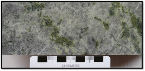 Figure 7: GS24-16 321.1m Showing Intense Textural Destruction and Late Epidote Flooding of Marginal Magmatic Breccia (Graphic: Business Wire)